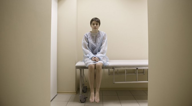 girl sitting in a hospital